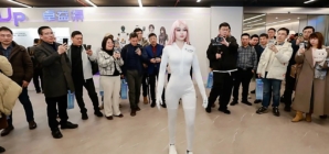 Moya humanoid robot has warm skin and camera eyes that track movement