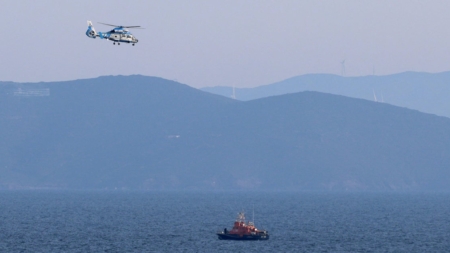Greek coast guard ship and migrant speedboat collide, killing at least 15 people