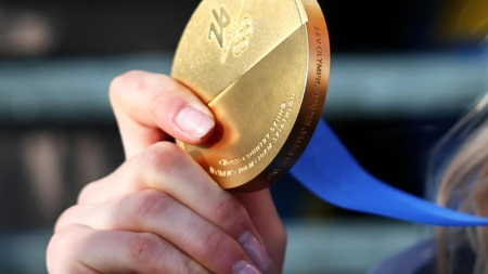 How much gold is in an Olympic gold medal, and how much is it worth?