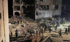 2 Iranian strikes on towns near Israel’s main nuclear research center injure more than 100 people