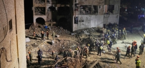 2 Iranian strikes on towns near Israel’s main nuclear research center injure more than 100 people