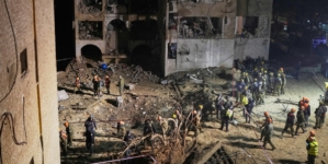 2 Iranian strikes on towns near Israel’s main nuclear research center injure more than 100 people