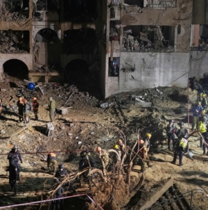 2 Iranian strikes on towns near Israel’s main nuclear research center injure more than 100 people