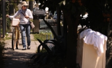 She’s a housekeeper with a side job: cleaning the trashed streets of her own neighborhood