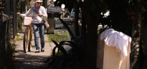 She’s a housekeeper with a side job: cleaning the trashed streets of her own neighborhood