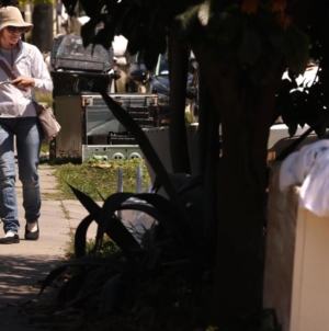She’s a housekeeper with a side job: cleaning the trashed streets of her own neighborhood