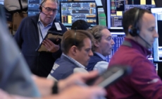 Stocks soar and oil prices plunge as Iran says Strait of Hormuz is open