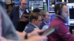 Stocks soar and oil prices plunge as Iran says Strait of Hormuz is open