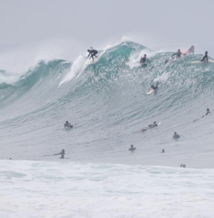 Huge waves from Hurricane Genevieve bring hazardous beach conditions
