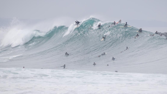 Huge waves from Hurricane Genevieve bring hazardous beach conditions