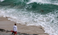 California lifeguards are rescuing thousands during high surf, heat waves this summer