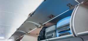 Why do airlines make passengers check their carry-on at the gate?