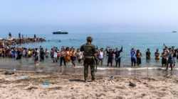 At least 67 people died in Ceuta border rush; Spain sends most migrants back to Morocco