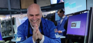 Dow soars 900 points on strong corporate earnings and hopes of Iran deal