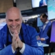Dow soars 900 points on strong corporate earnings and hopes of Iran deal