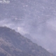 Firefighters battling brush fire in Burb